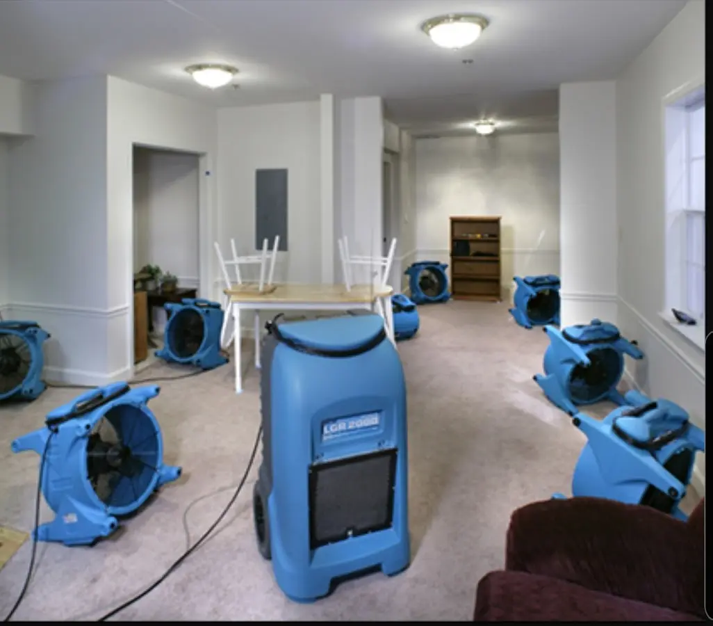 Air movers and dehumidifier setup for Water Extraction & Removal in Brownville